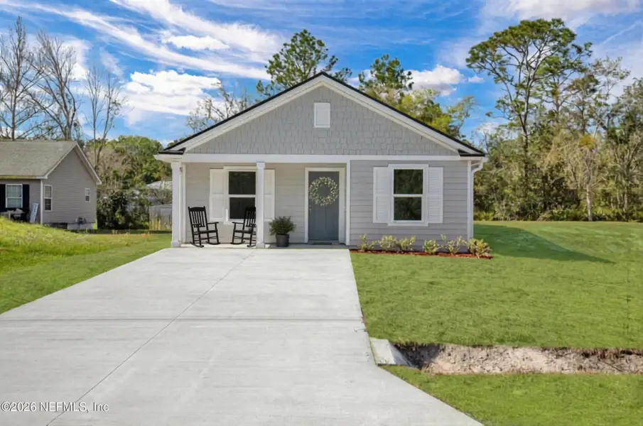 Front exterior of a new home in , East Palatka, FL, highlighting curb appeal (Image 1). Front exterior of a new home in , East Palatka, FL, highlighting curb appeal (Image 1).