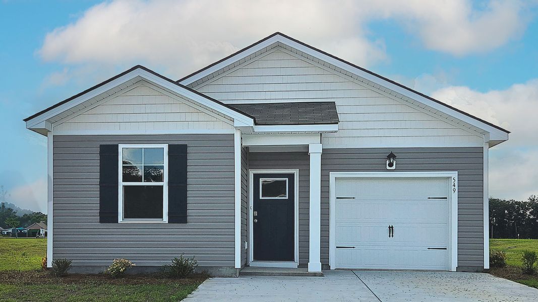 Front exterior of a new home in The Bluffs at Mill Creek, Florence, SC, highlighting curb appeal (Image 1). Front exterior of a new home in The Bluffs at Mill Creek, Florence, SC, highlighting curb appeal (Image 1).