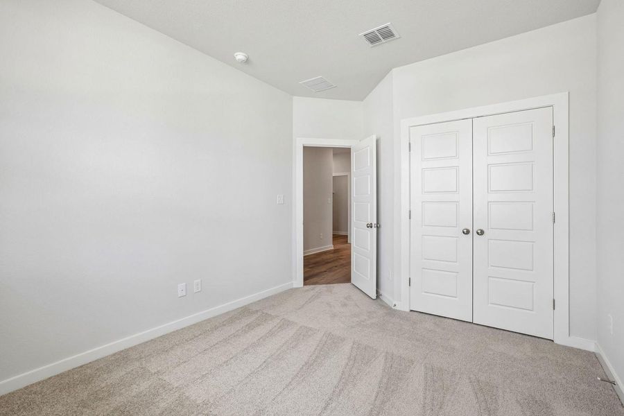Spacious, unfurnished interior of a new home in Stallion Run, Buda (Image 21).