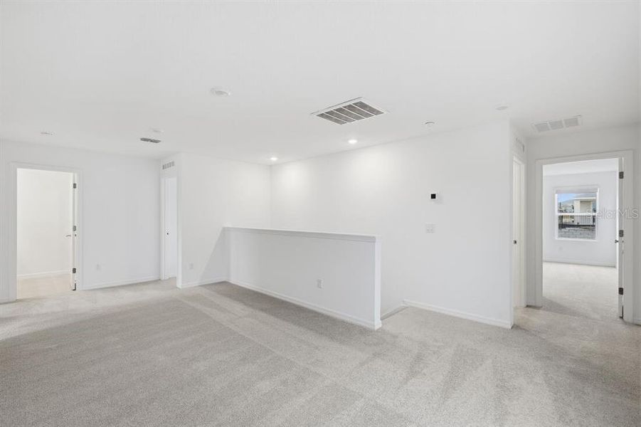 Spacious, unfurnished interior of a new home in Waterstone, Groveland (Image 40).