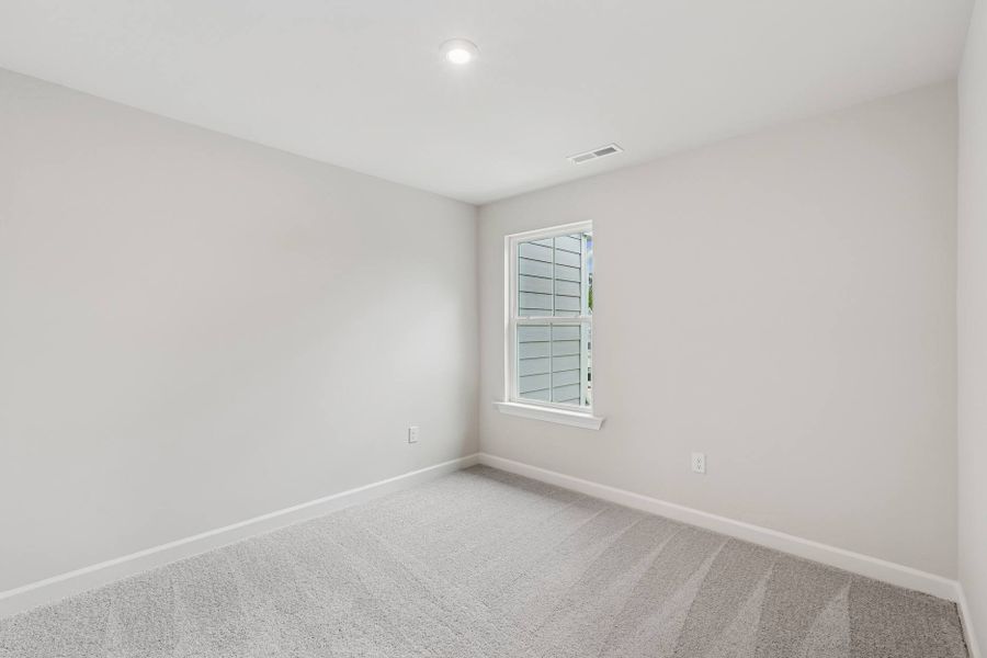 Representative unfurnished interior of a home built from the Eno by Tri Pointe Homes in Tredenham, Durham (Image 15).