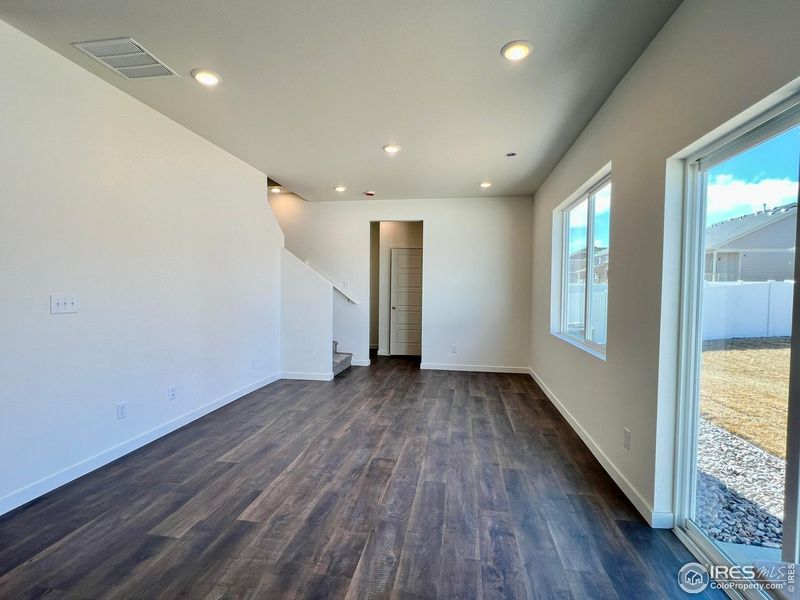 Spacious, unfurnished interior of a new home in Union Colony West, Greeley (Image 12).
