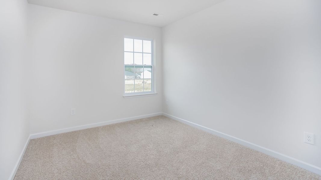 Spacious, unfurnished interior of a new home in The Gables at Edinborough Townes, Gibsonville (Image 17).