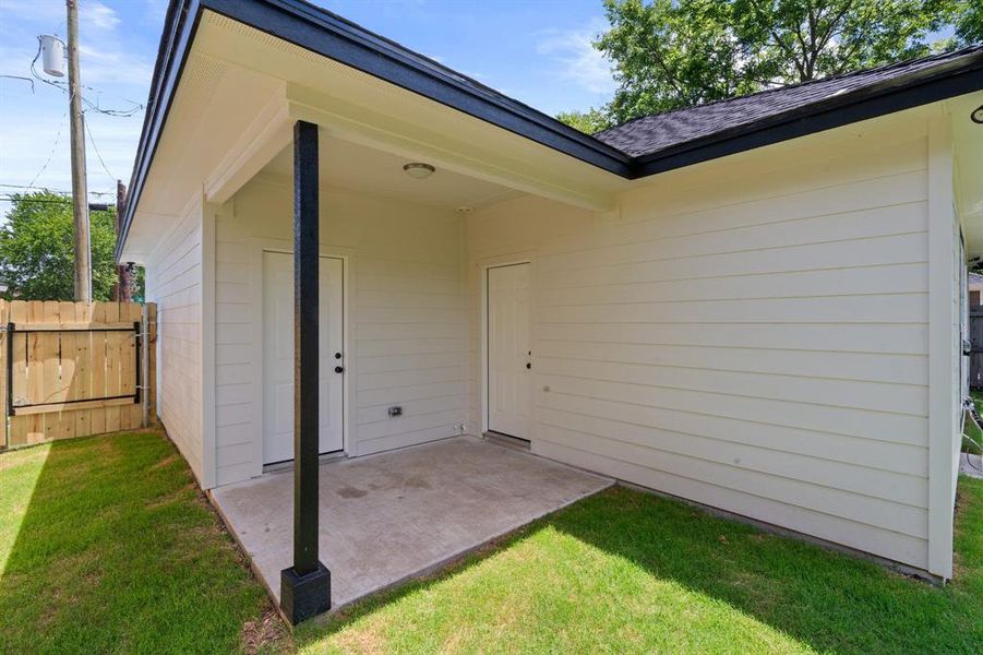 Property entrance featuring a patio Property entrance featuring a patio