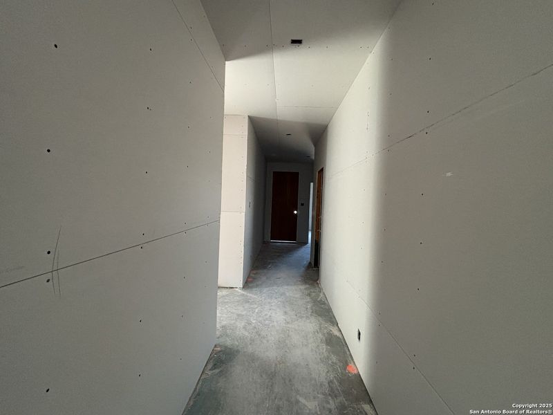 In-progress construction of a new home in The Summit at Saddlebrook Ranch 55's, Schertz, TX (Image 31).