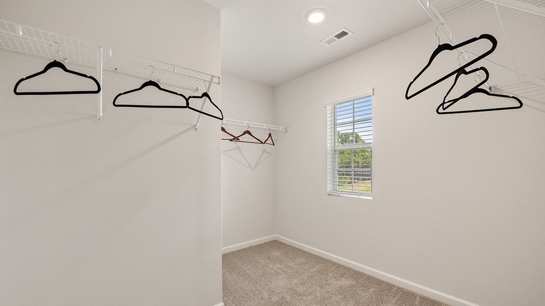 Representative furnished interior of a home built from the ROBIE by D.R. Horton in Pointe Park, Union City (Image 28).