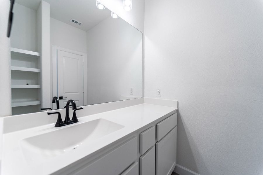 Furnished interior view inside a new home in Green Meadows, Celina (Image 12).