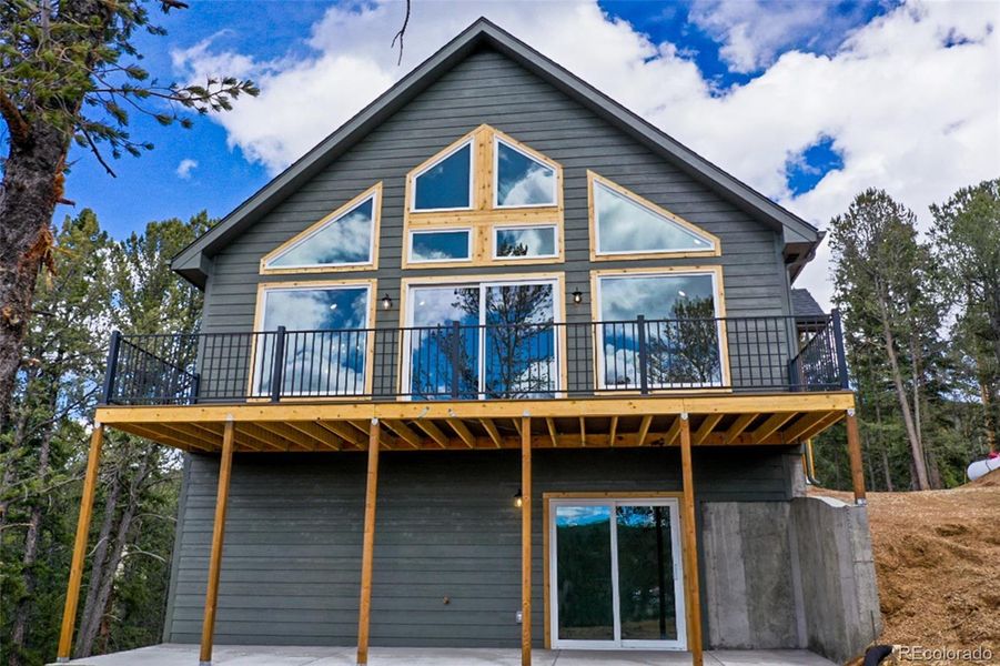 Front exterior of a new home in , Divide, CO, highlighting curb appeal (Image 23). Front exterior of a new home in , Divide, CO, highlighting curb appeal (Image 23).