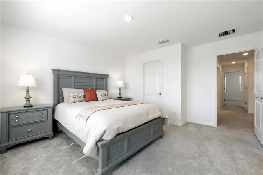 Furnished interior in a model home at The Townhomes at Azario Lakewood Ranch in Bradenton (Image 16).