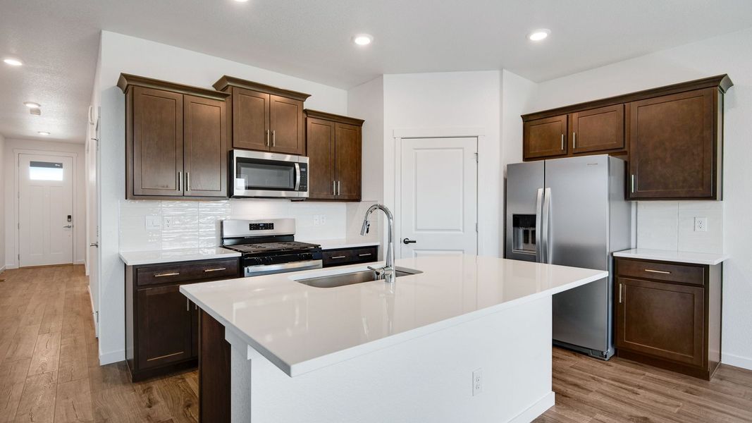 Representative furnished interior of a home built from the Harmony by D.R. Horton in Sky Ranch, Watkins (Image 7).