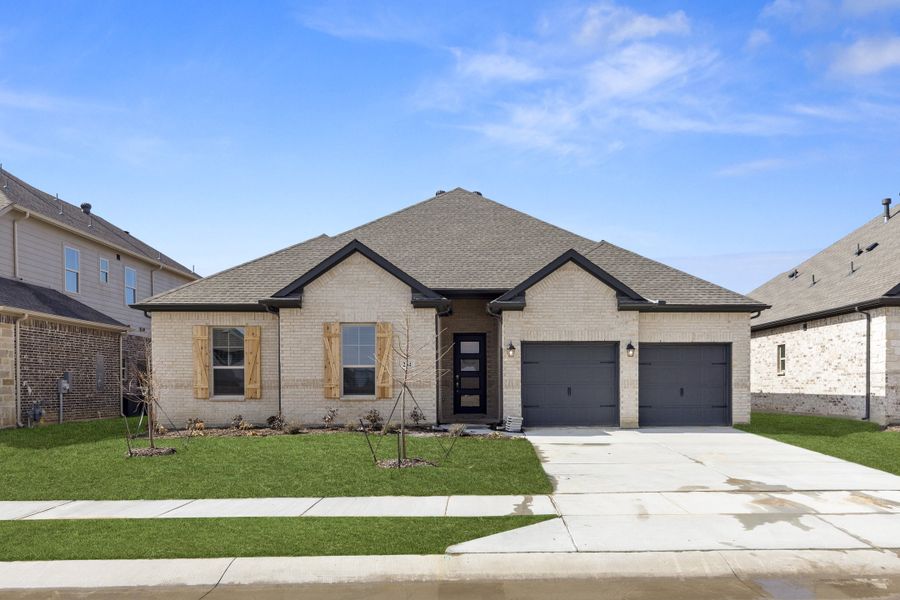 Representative exterior photo of a completed home built from the Westwood by Sandlin Homes in Lakesong, Midlothian, TX (Image 21).