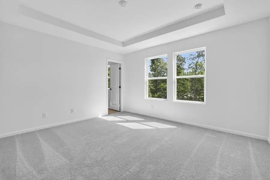 Spacious, unfurnished interior of a new home in Weatherfield, Buford (Image 19).