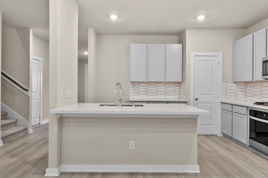 Furnished interior view inside a new home in Westridge Cove, Conroe (Image 7).