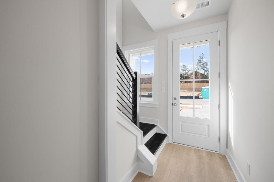 Photo is of a similar home