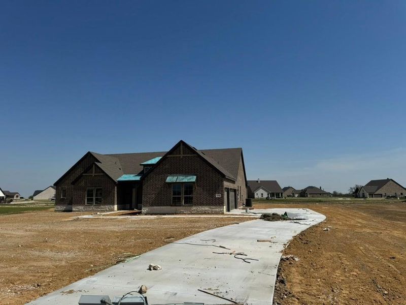 In-progress construction of a new home in Rocky Top, Krum, TX (Image 12).