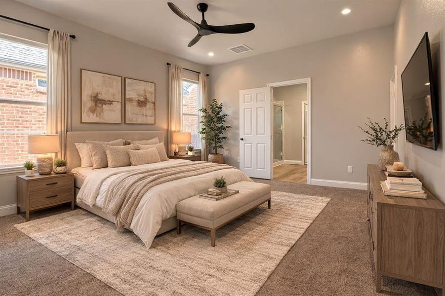 Bedroom featuring light carpet, ceiling fan, ensuite bathroom, and recessed lighting