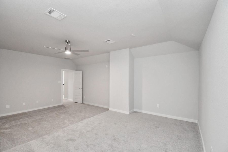 Another perspective of the spacious media room. Sample photo of completed home with similar floor plan. Actual colors and selections may vary.