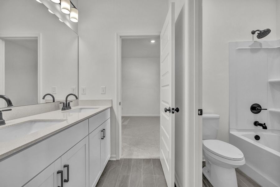 Furnished interior view inside a new home in Grand Park, Leland (Image 11).