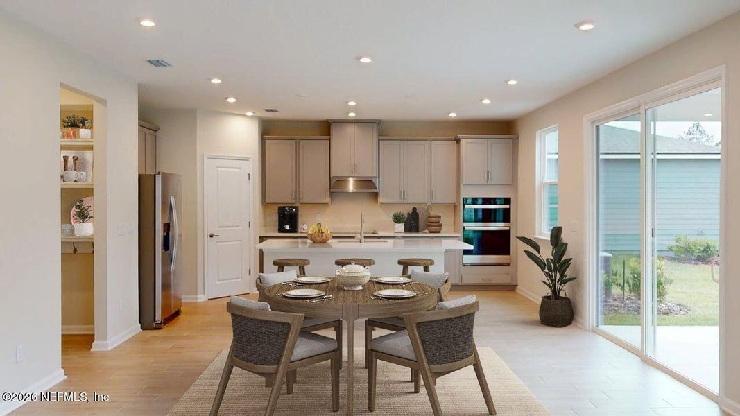 Furnished interior view inside a new home in Lakes at Bella Lago, Green Cove Springs (Image 6).