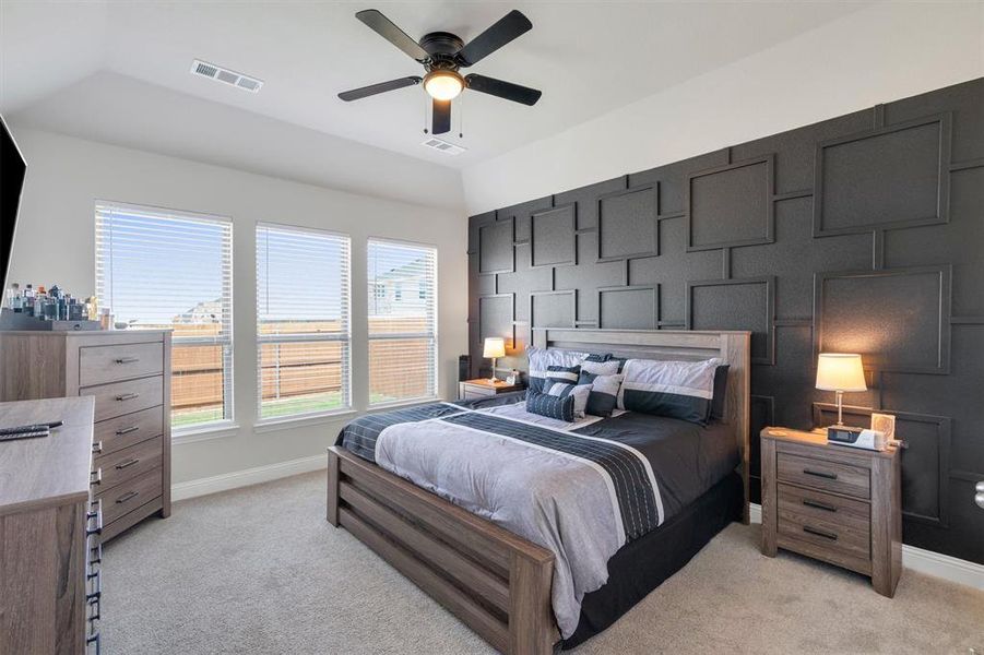 Accent wall featuring geometric panel molding