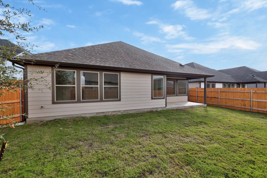 Exterior details and patio area of a home in Prairie Winds, Hutto (Image 23).