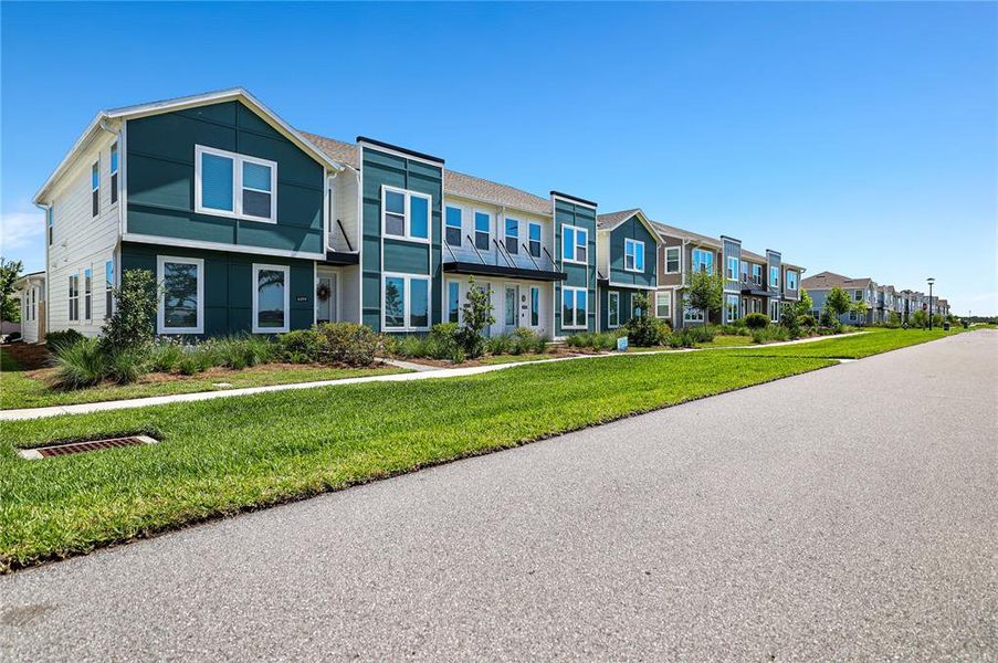 Front exterior of a new home in , St. Cloud, FL, highlighting curb appeal (Image 12). Front exterior of a new home in , St. Cloud, FL, highlighting curb appeal (Image 12).