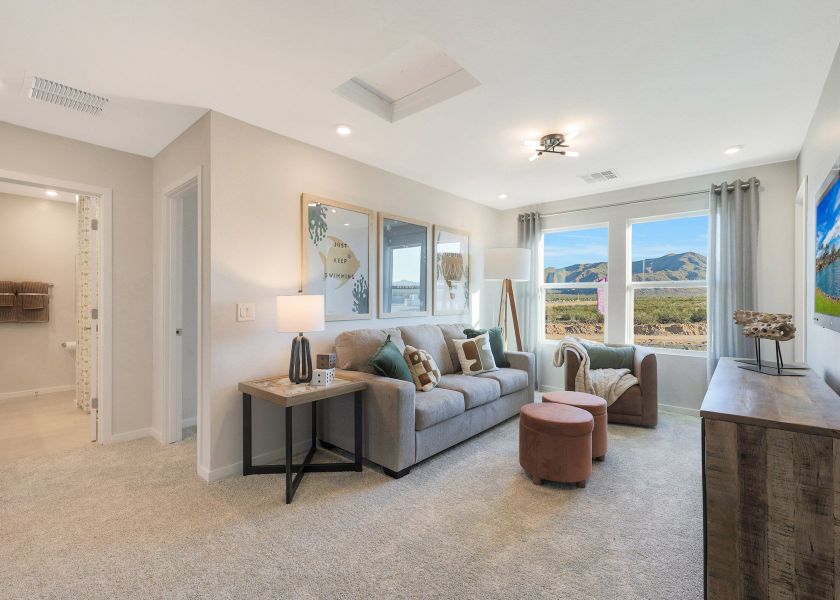 A living room with a large window.
