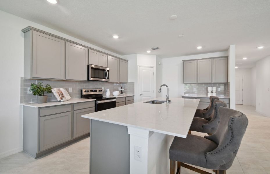 Furnished interior view inside a new home in Oakfield Lakes, Parrish (Image 4).