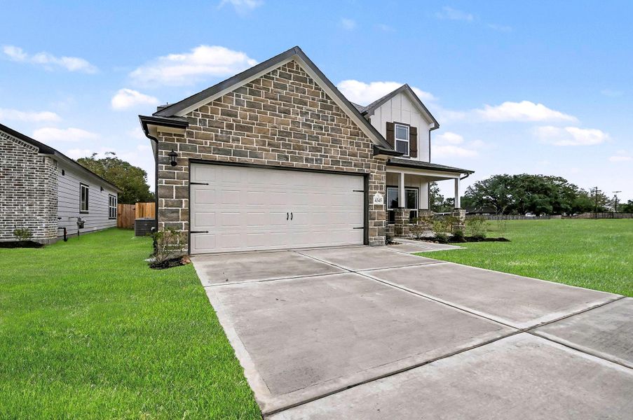 Front exterior of a new home in , Bay City, TX, highlighting curb appeal (Image 15). Front exterior of a new home in , Bay City, TX, highlighting curb appeal (Image 15).