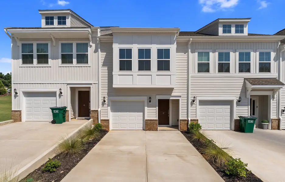 Front exterior of a new home in Edwards Station, Taylors, SC, highlighting curb appeal (Image 1). Front exterior of a new home in Edwards Station, Taylors, SC, highlighting curb appeal (Image 1).