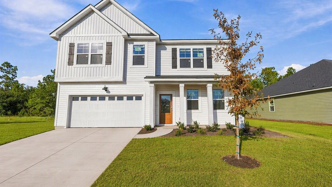 Representative exterior photo of a completed home built from the Hanover by D.R. Horton in Laurel Grove, Guyton, GA (Image 1). Representative exterior photo of a completed home built from the Hanover by D.R. Horton in Laurel Grove, Guyton, GA (Image 1).