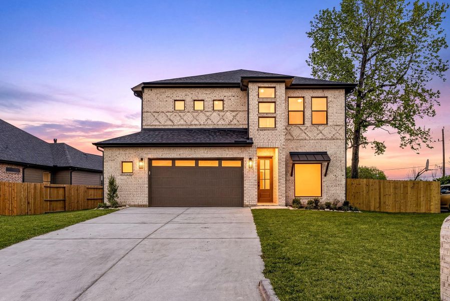 Front exterior of a new home in , Tomball, TX, highlighting curb appeal (Image 26).