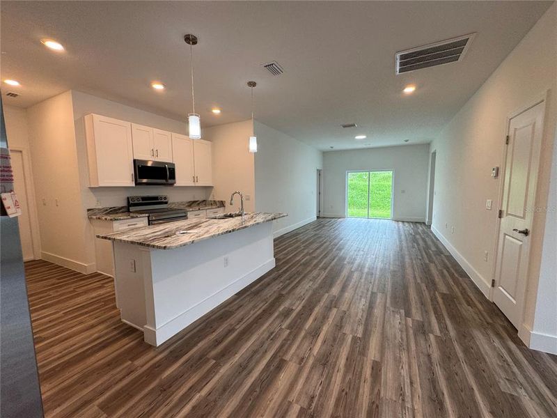 Furnished interior view inside a new home in , Ocala (Image 8).