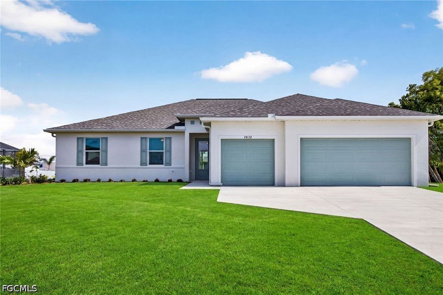 Front exterior of a new home in Cape Coral, Cape Coral, FL, highlighting curb appeal (Image 20).