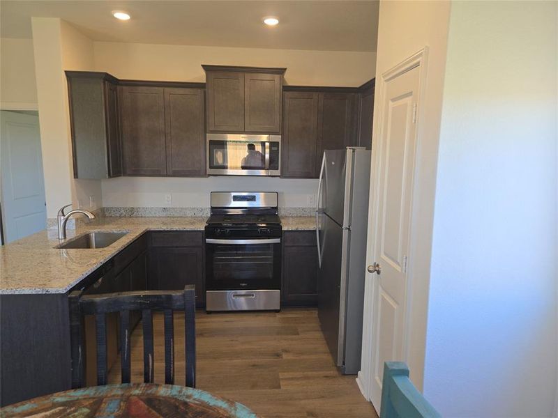 Furnished interior view inside a new home in Big Sky Estates, Ponder (Image 9).