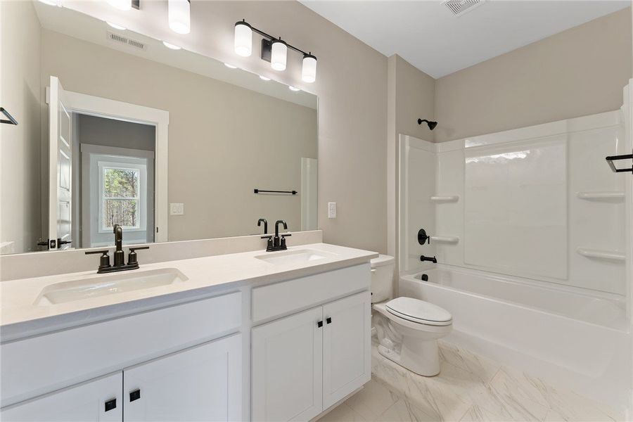 Images are of a different home with a similar floo