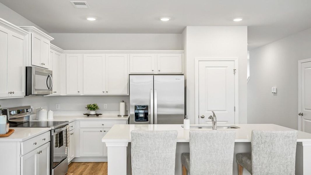 Furnished interior view inside a new home in The Crossing at St. James, Goose Creek (Image 6).
