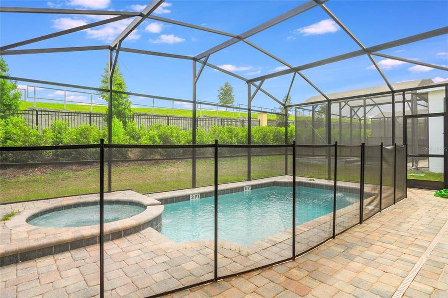 Exterior details and patio area of a home in Solara Resort, Kissimmee (Image 23).