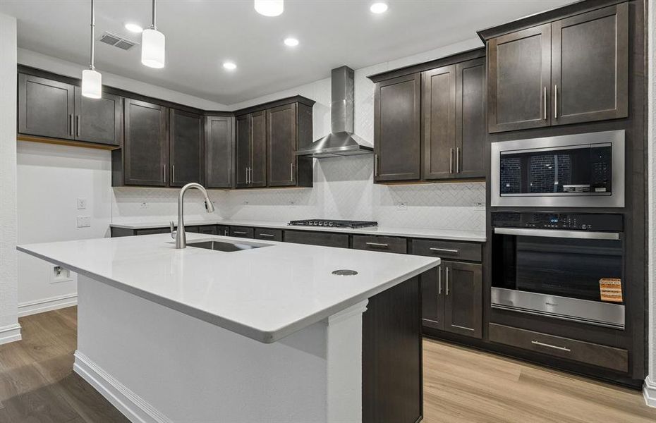 Spacious kitchen with eat-in island Spacious kitchen with eat-in island