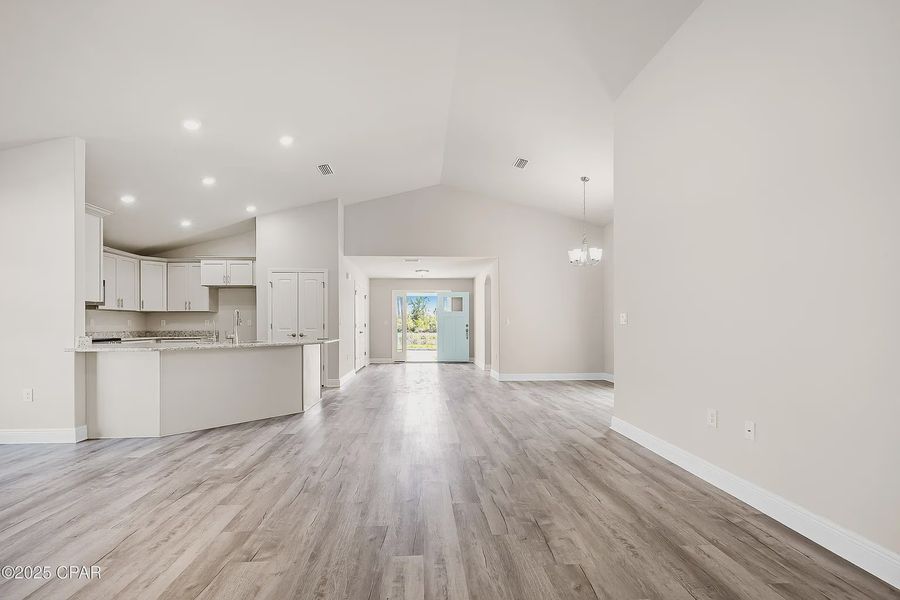 Representative unfurnished interior of a home built from the Plan 2101 by Adams Homes in The Bluffs at Lafayette, Freeport (Image 13).