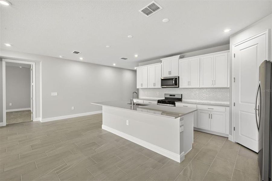 Furnished interior view inside a new home in Wellen Park, Venice (Image 12).