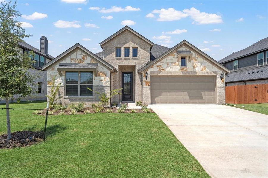 Front exterior of a new home in Renaissance, Waco, TX, highlighting curb appeal (Image 20).