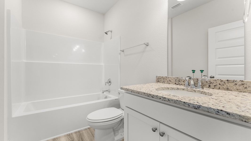 Representative furnished interior of a home built from the The Destin by D.R. Horton in Pine Creek and Heron Walk, Port St. Joe (Image 35).