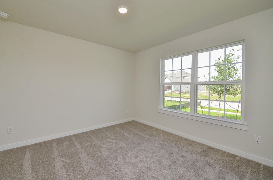 Spacious, unfurnished interior of a new home in Sunterra, Katy (Image 16).