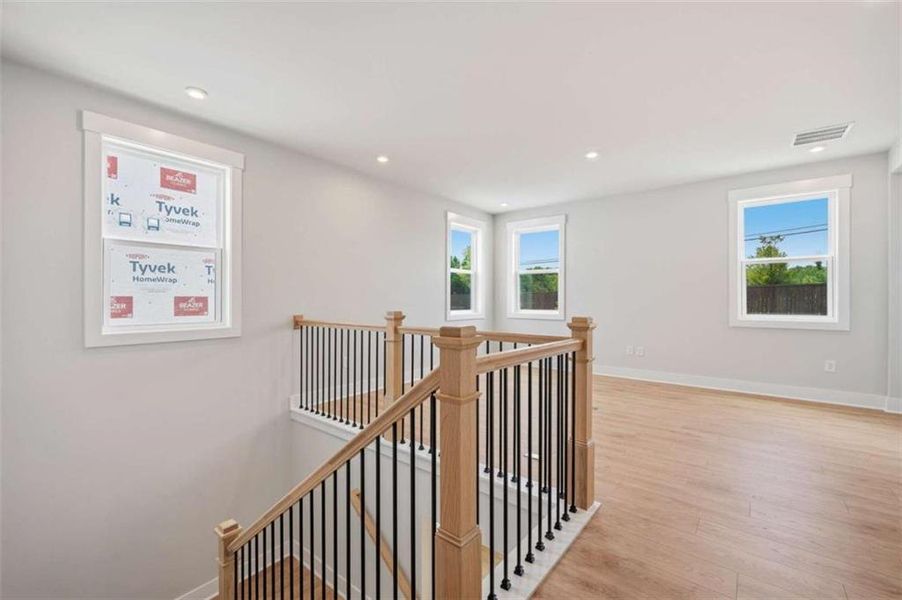Spacious, unfurnished interior of a new home in The Paddocks at Doc Hughes, Buford (Image 34).