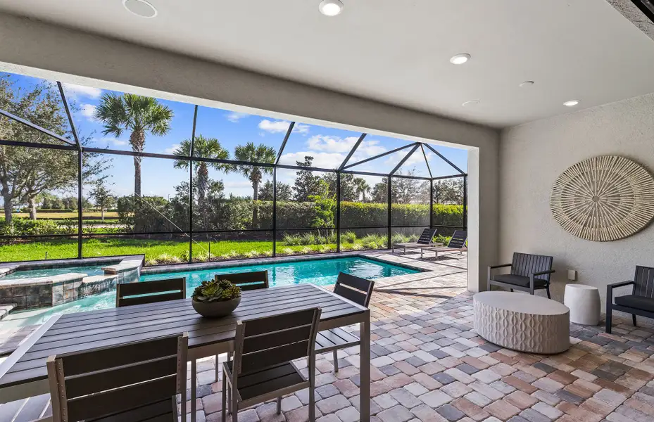 Exterior details and patio area of a home in Avondale at Avenir, Palm Beach Gardens (Image 4).