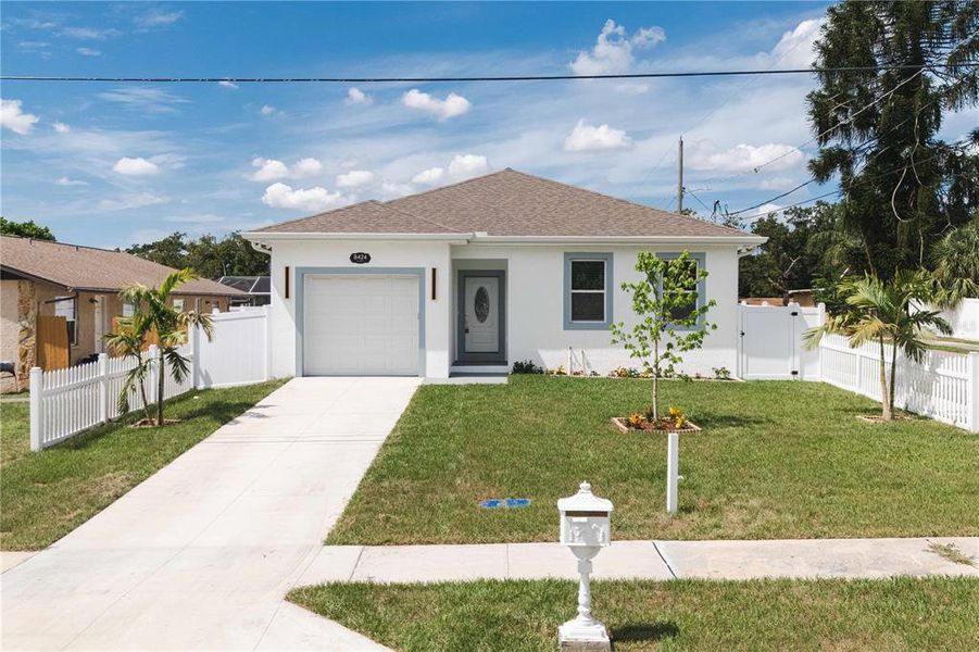 Front exterior of a new home in , Tampa, FL, highlighting curb appeal (Image 24). Front exterior of a new home in , Tampa, FL, highlighting curb appeal (Image 24).
