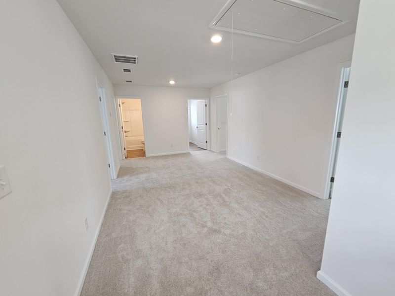 Spacious, unfurnished interior of a new home in Creekside at Andrews, Summerville (Image 24).