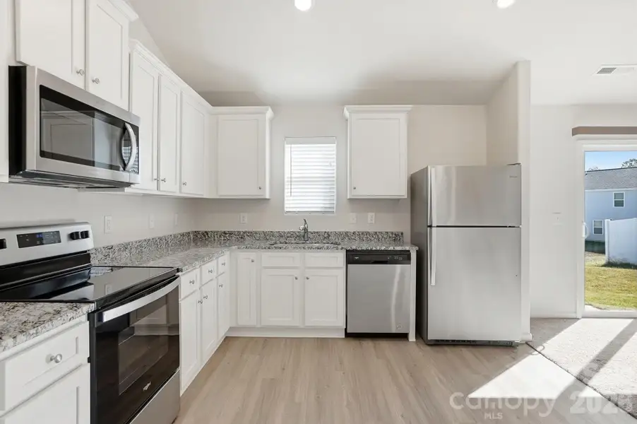 Furnished interior view inside a new home in Knights Bridge, Richburg (Image 8).