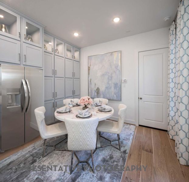 Furnished interior view inside a new home in Bridgeland, Cypress (Image 23).